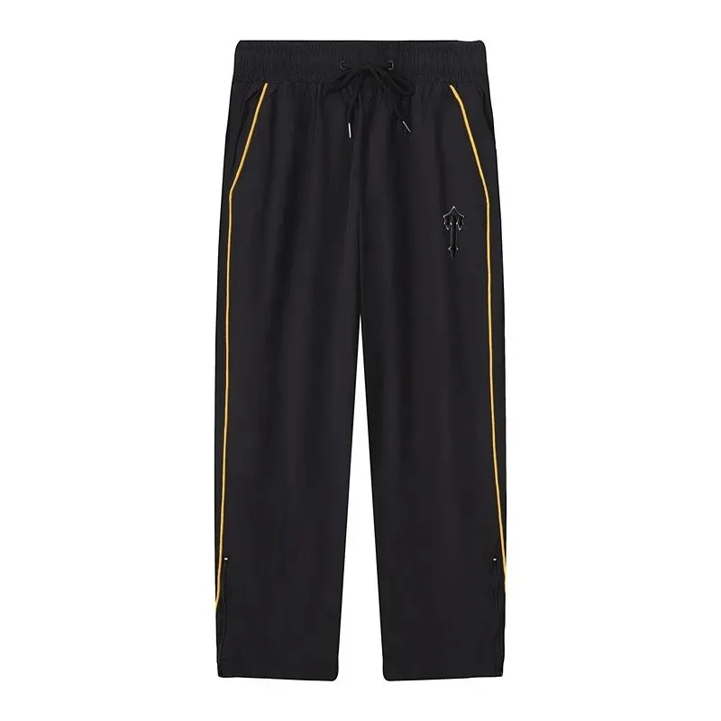3104 black and yellow pants
