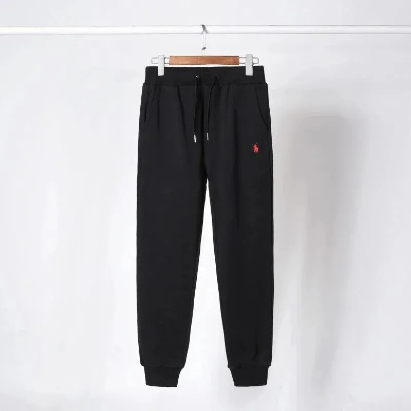 Black pants with red label