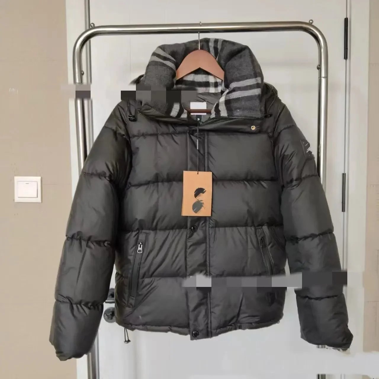 Black collar Burberry down jacket
